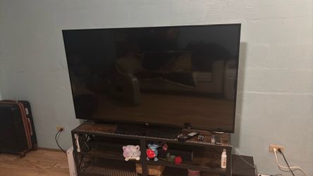 65 inch flatscreen TV for sale with TV stand $150