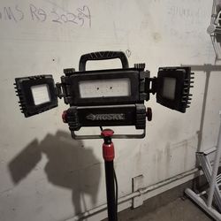 Husky multi directional light with tripod.
