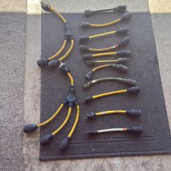 Assorted twist lock construction adapters