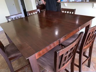 Kitchen table includes 8 chairs