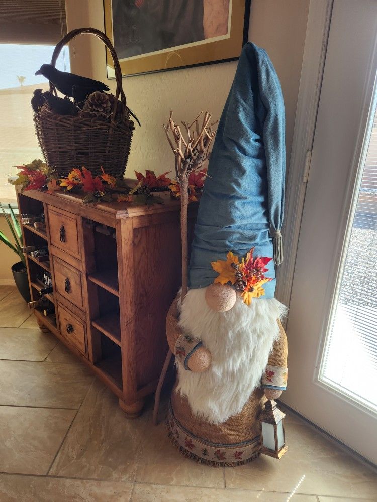 Hand crafted, one of a kind 4.5 ft tall gnome, decorate for any season!