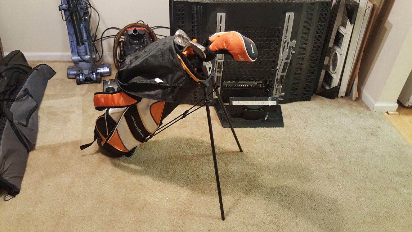Child's golf clubs and bag
