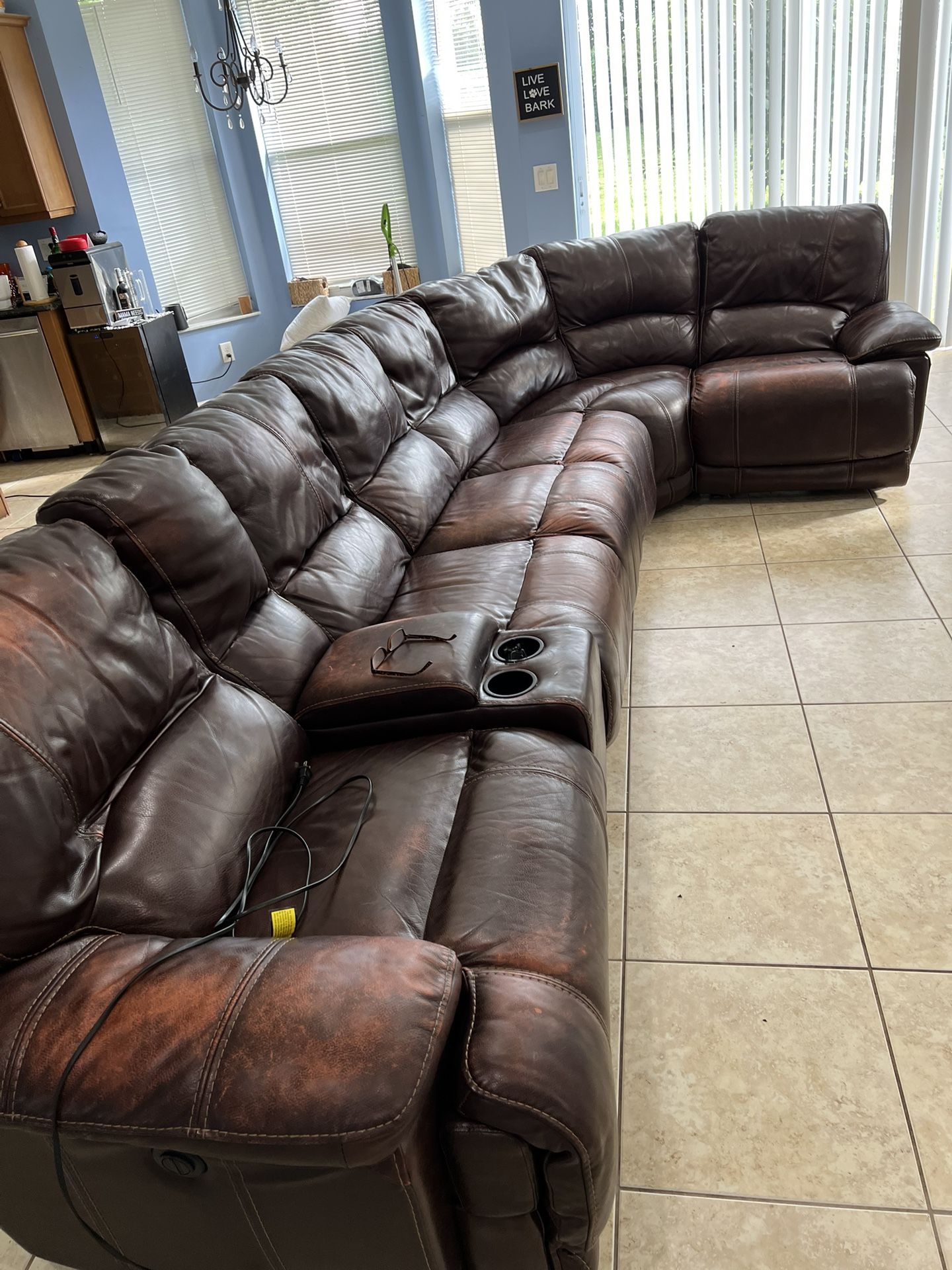 Leather Reclining Sectional.