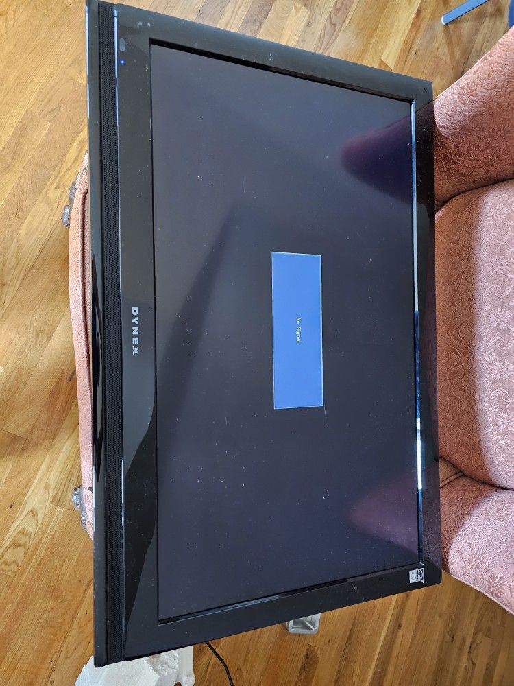 A Couple Of TVs With Wall Mounts