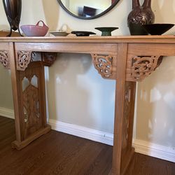 carved wood entry table
