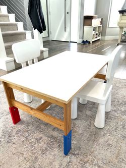 Kids wooden table with two chairs