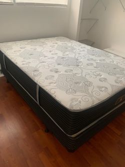 New queen mattress and box spring 2 pc bed frame is not included