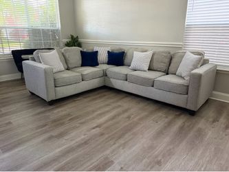 Light gray sectional sofa