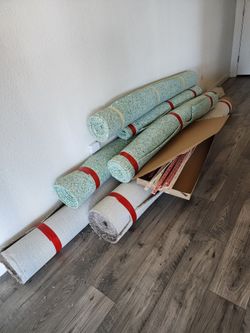 300 Sq. Feet Of NEW carpet with padding Floor