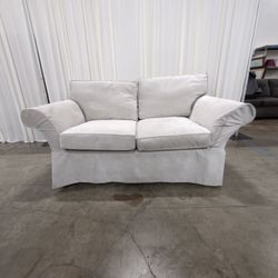 Light Gray Fabric Slipcovered Rolled Arm Loveseat