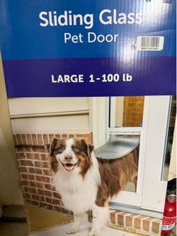 Sliding glass door dog door