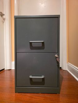 2-Drawer vertical file cabinet, lockable.