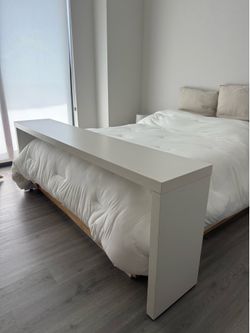 Ikea Malm occasional table over the bed