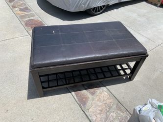 Black Leather and dark wood ottoman