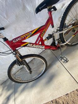Magna Excitor 21-Speed Dual Suspension Mountain Bike.