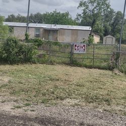 1216.00 Sq Ft Land including Trailer (3 bedrooms/2  Bathrooms) .  Has a Small Tool Shed.  $75,000 