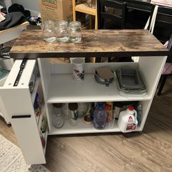 Kitchen Island With Retractable Cabinet