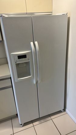 Nice and clean side by side white fridge
