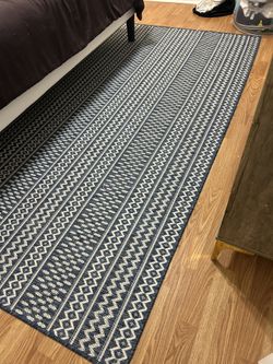 Blue and White Patterned Area Rug