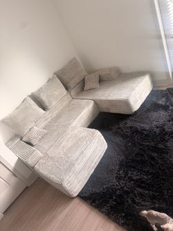 BRAND NEW Boneless sectional W/ ottoman