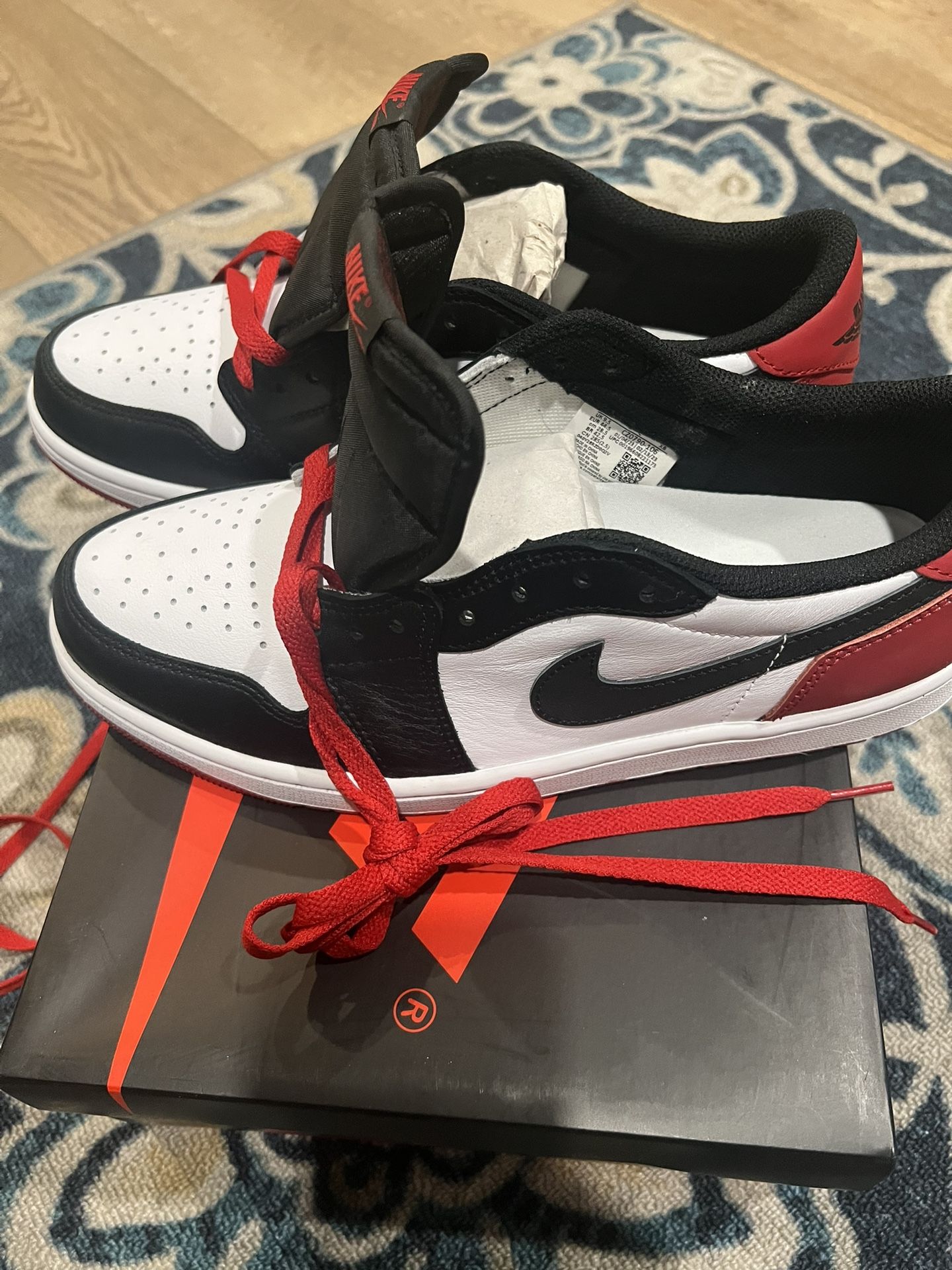 Jordan 1 low black toe 2023
