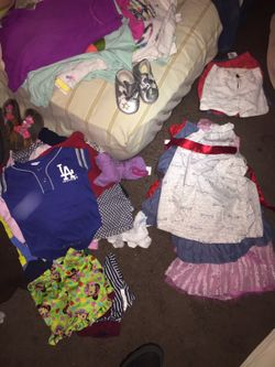 Baby girl and baby clothes