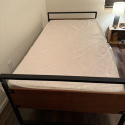 Twin Bed And Frame (almost New Mattress)