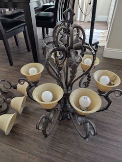 Chandler and wall sconces