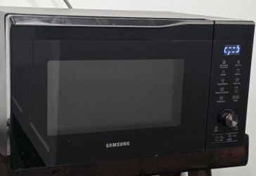 Samsung MC11K7035CG Black Stainless Steel Convection Microwave oven 1.1 Cu.Ft.