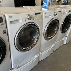 LG washer and electric dryer on pedestal comes with 90 day warranty