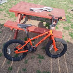 Orange bike with no training wheels