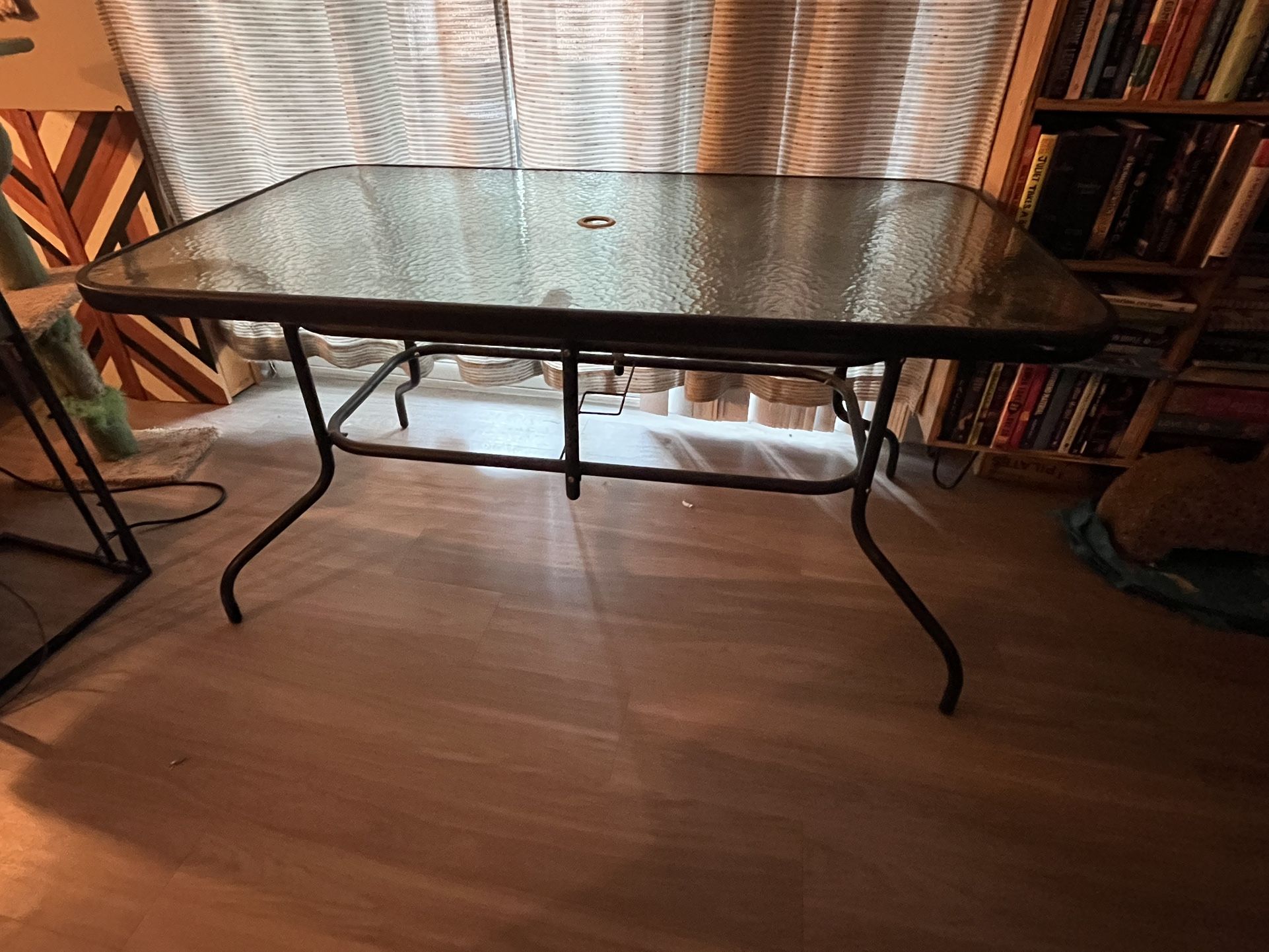 Glass Patio table 31.5” X 55” 