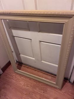 Misc frames oval are plastic and match a wood square one
