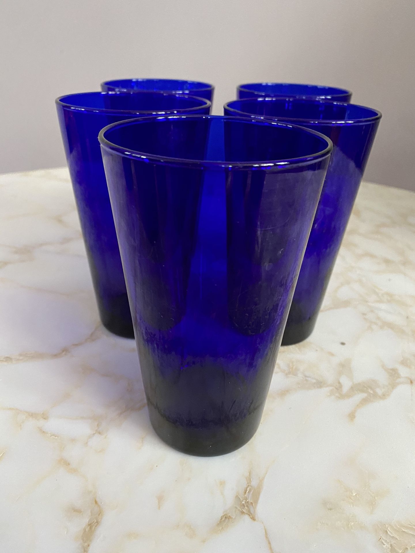 Vintage set of five cobalt blue glass tumblers. Good pre owned condition.