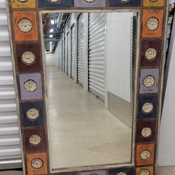 a mirror with a wooden frame, a limited edition that is no longer possible to buy in any store.