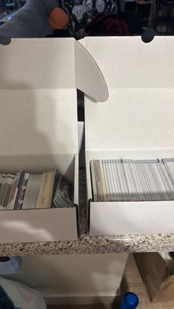 Two boxes of NBA. Monopoly chrome, select and Topps holiday