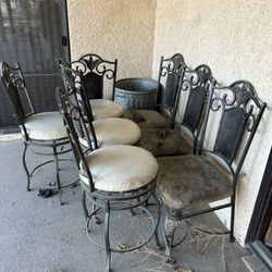 Rod Iron Indoor It Patio Furniture 4 Bar Stools Four Chairs With A Round Glass Table For Four And A Bakers Rack The Chairs Need Postering .  