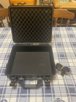 LeKufee airtight waterproof storage case with shoulder strap.