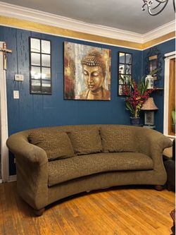 Curved dark green Sofa