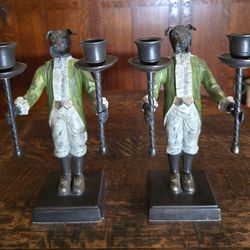 Vintage pair of bronze candlestick holders, dogs dress  in 18th century butler  clothing  this are 10" tall.