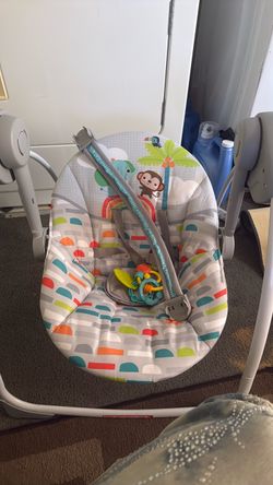Baby swing and Millie Moon diapers