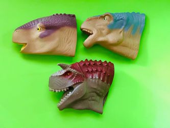 Dinosaur hand puppets. In very good condition.