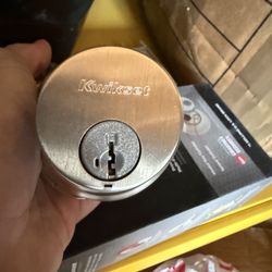 Kwikset lock new and never used but open box with