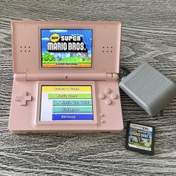 Pink Nintendo DS with Super Mario Bros. game in excellent condition.  $65