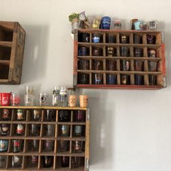 Impressive shot glass collection with Coca Cola antique crates