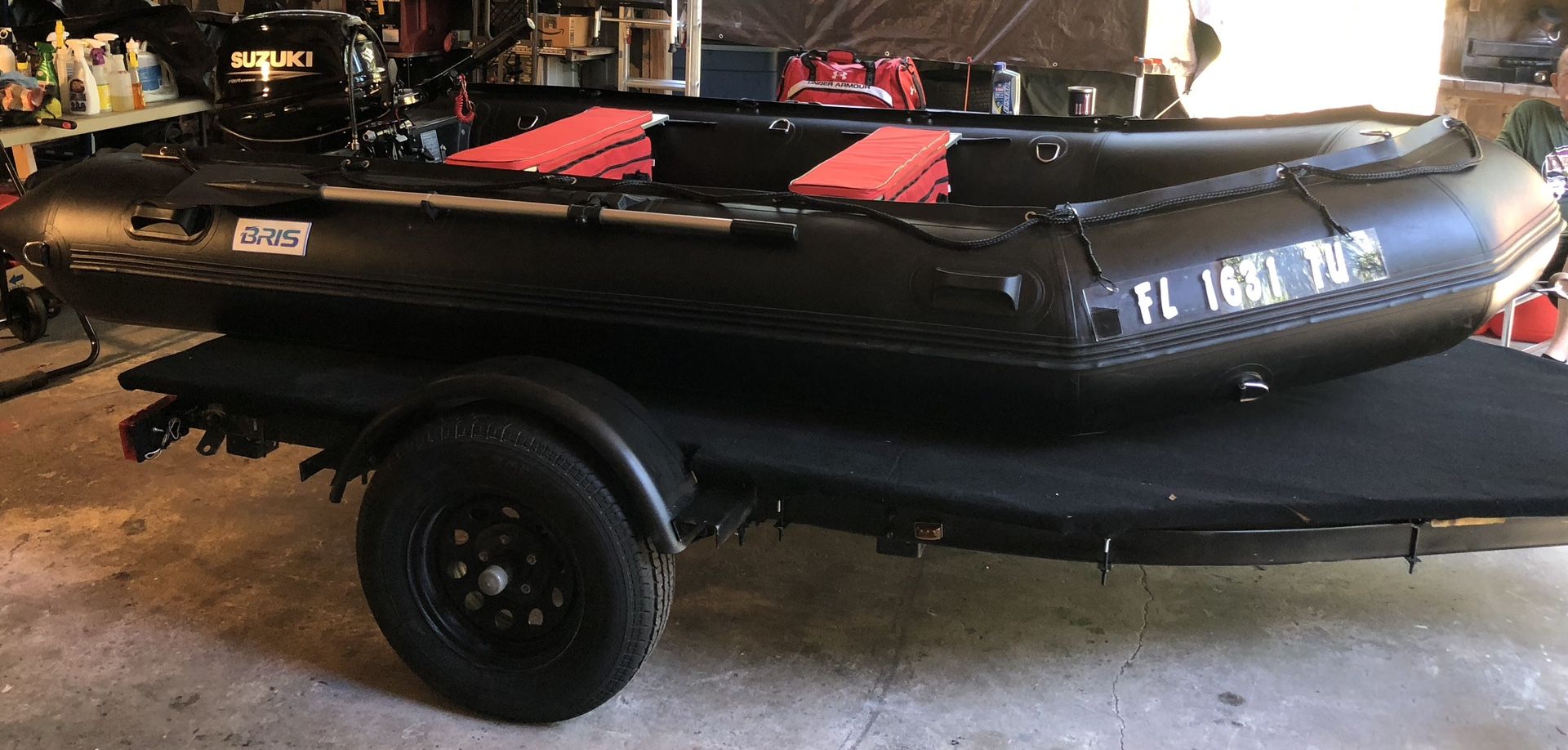 New 12.5’ BRIS Inflatable with Suzuki 20 HP 4-Stroke. 1 HOUR ON BOAT AND MOTOR.