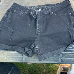 J Lo. Jennifer Lopez Black Denim Shorts With Rip Design.