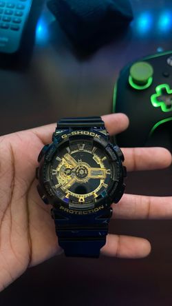 Gold and black G-shock