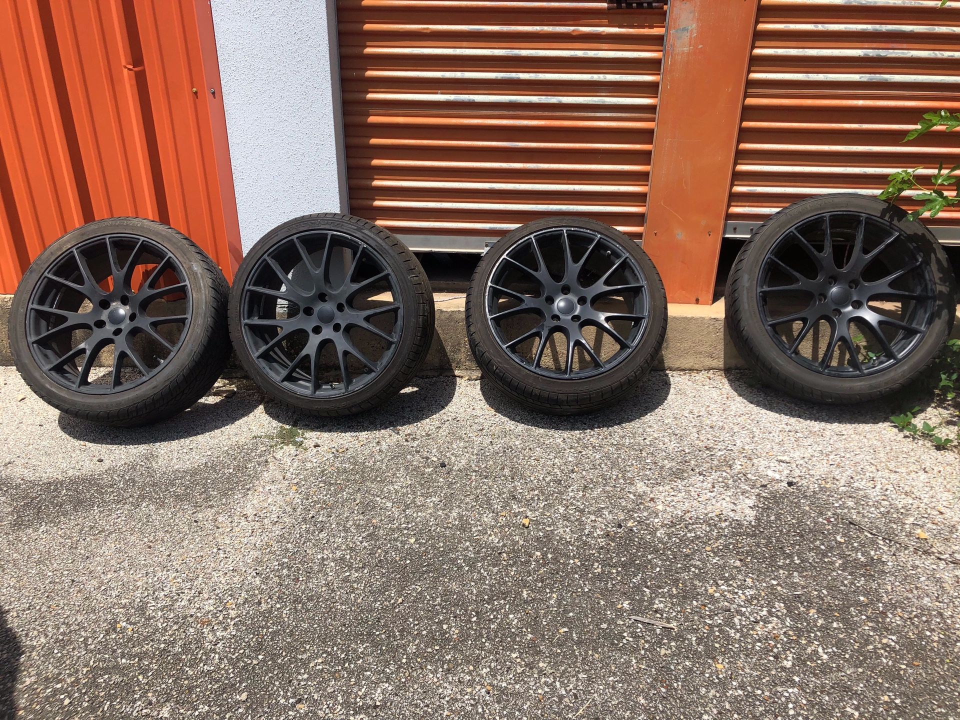 Black SUV rims with tires