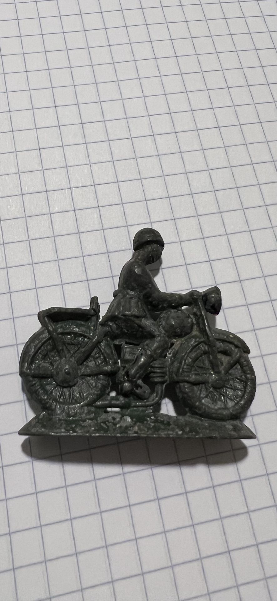 military man on a motorcycle of the USSR 50-70 years old material tin metal